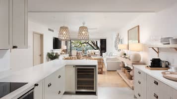 Condo, 3 quartos | Cozinha privada | Geladeira, micro-ondas, fogão, cooktop