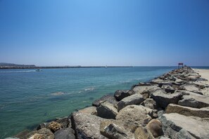 On the beach, sun loungers, beach towels
