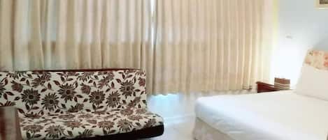 Habitación clásica doble | Camas supletorias y wifi gratis