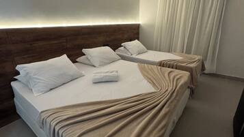 Panoramic Triple Room | Minibar, blackout drapes, iron/ironing board, free WiFi