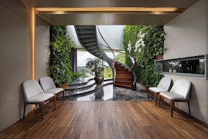 Imperial Sky Suite | Living area | 40-inch LCD TV with cable channels, TV