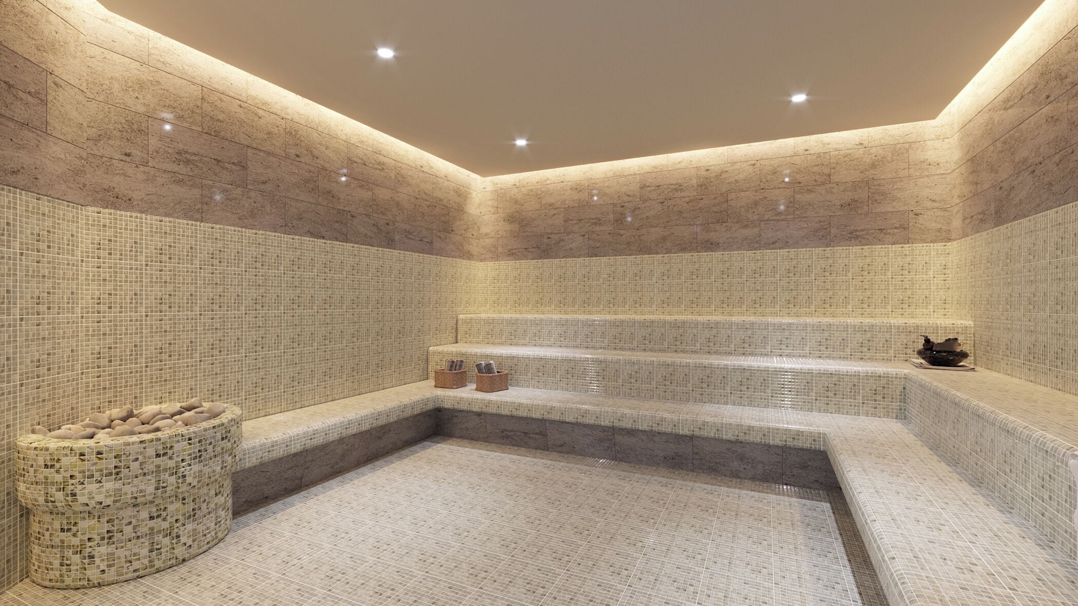 Un cuarto de spa con pared de piedra, una zona de estar y una pequeña mesa con revistas.
