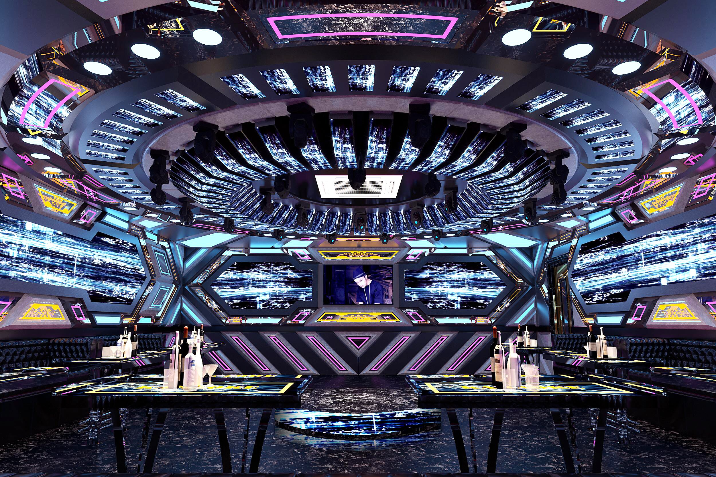 A futuristic control room with multiple screens, a central console, and a circular seating arrangement.