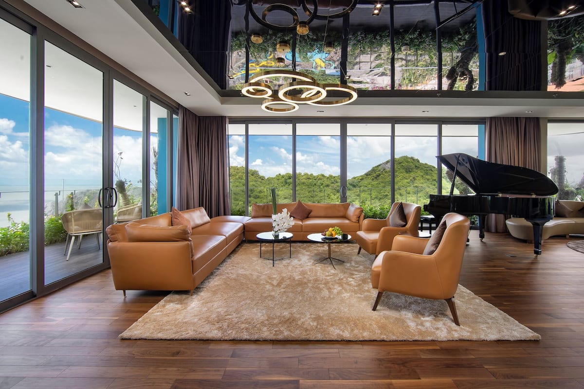 Suite presidencial | Área de sala de estar | Televisión LCD de 40 pulgadas con canales por cable y televisión
