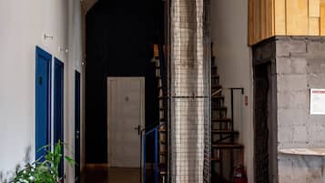 Habitación económica, baño compartido | Zona de estar