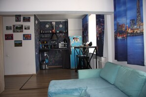 Apartemen | 1 kamar tidur, setrika/meja setrika, Wi-Fi gratis, dan seprai linen