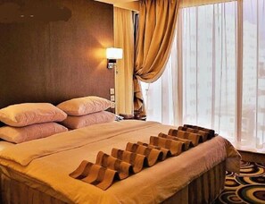 Ropa de cama de alta calidad, minibar, caja fuerte