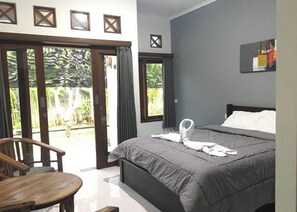 ห้องสแตนดาร์ดดับเบิล, วิวสวน | มินิบาร์, โต๊ะทำงาน, Wi-Fi ฟรี, ผ้าปูที่นอน