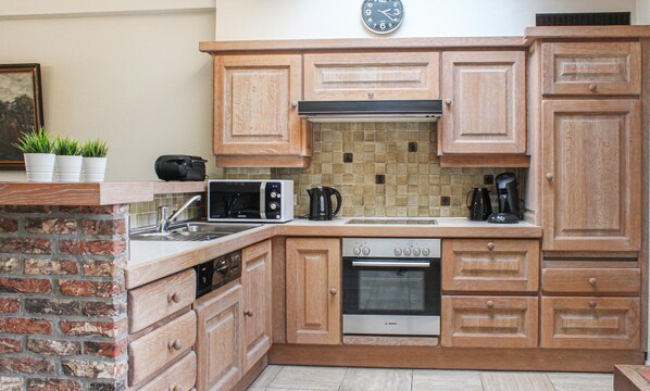 Réfrigérateur, four, plaque de cuisson, lave-vaisselle