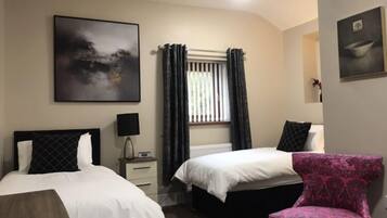 Chambre Classique avec lits jumeaux | Fer et planche Ă repasser, Wi-Fi gratuit