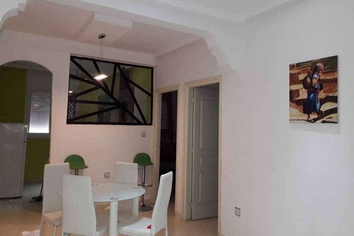 Family Apartment, 2 Bedrooms (Rez-de-chaussée) | Living area | 60-cm flat-screen TV with satellite channels, TV