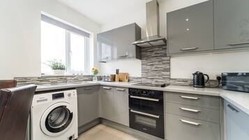 Apartment | Private kitchen | Coffee/tea maker, fridge, microwave, oven