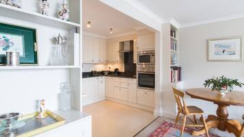 Departamento (1 Bedroom) | Cocina privada | Microondas, horno, parrilla de estufa y lavavajillas