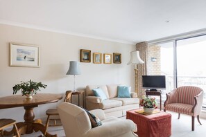 Apartment (1 Bedroom) | Living area | TV