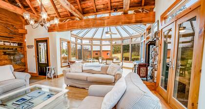 Beautiful, rustic home w/ on-site playground, deck, patio, grill, and fireplace