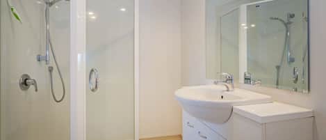 1 Bedroom Unit | Bathroom | Shower, hair dryer, towels, soap