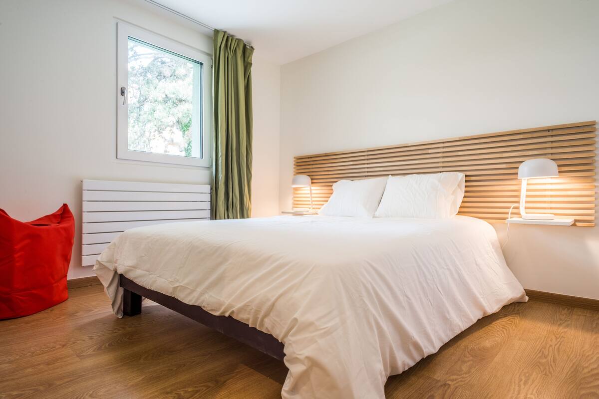 1 bedroom, down comforters, blackout drapes, iron/ironing board