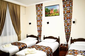 Standard Triple Room | Individually decorated, desk, laptop workspace, free WiFi