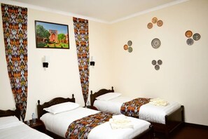 Standard Triple Room | Individually decorated, desk, laptop workspace, free WiFi