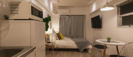 Apartment (5-A) | Wohnbereich | Flachbildfernseher