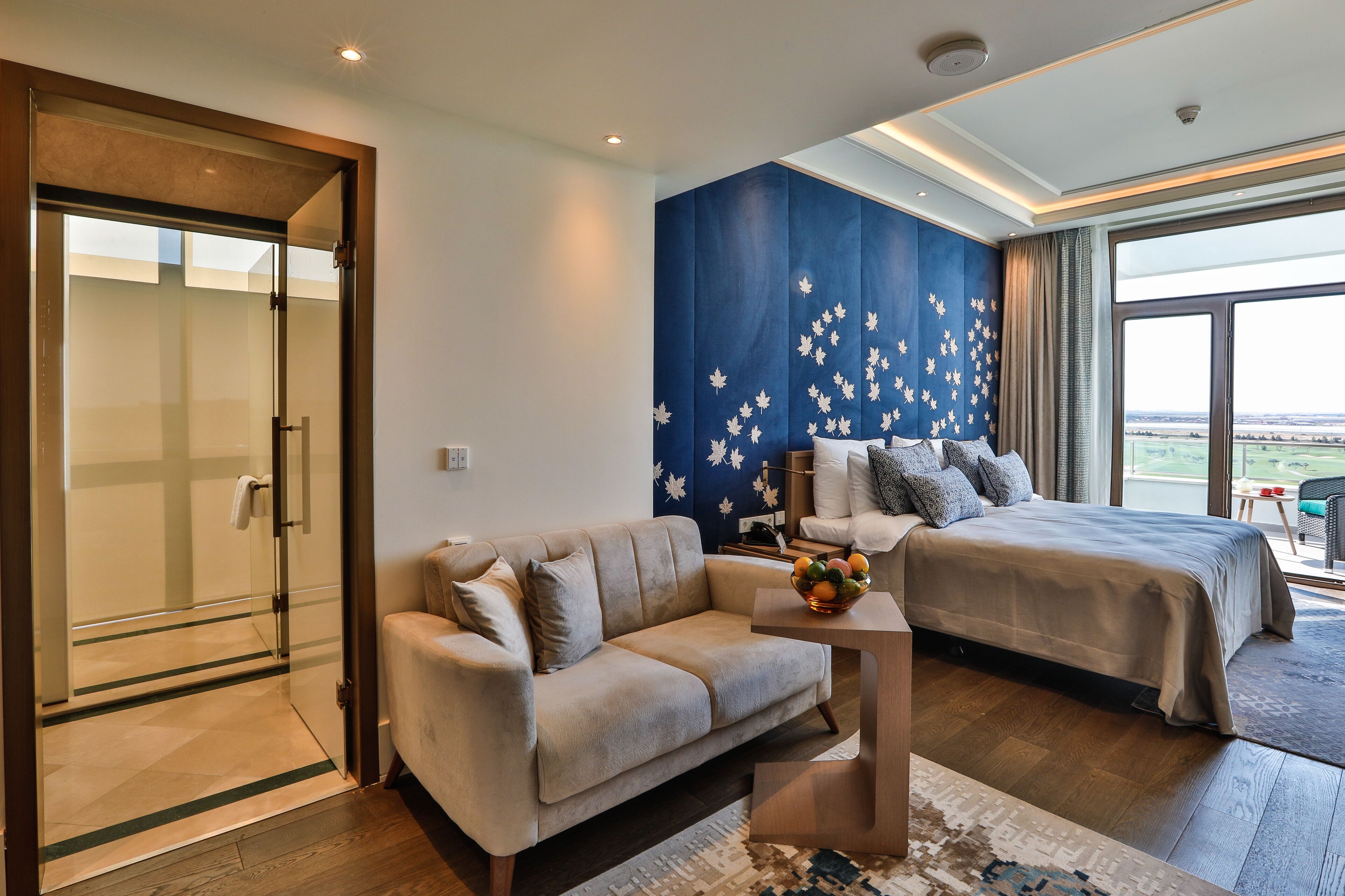 superior double or twin room | living area | 103-inch smart tv with cable channels, tv