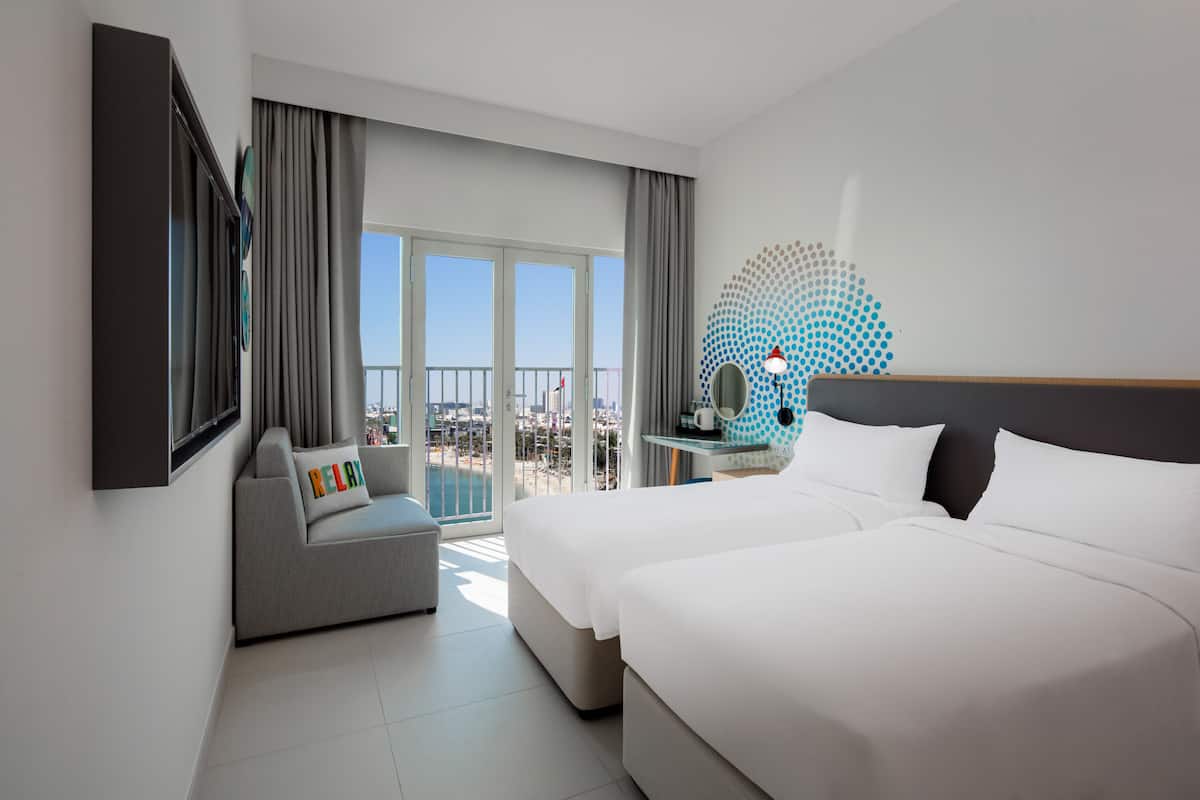rover room sea view free shuttle service to dubai mall, private beach | in-room safe, desk, laptop workspace, blackout curtains