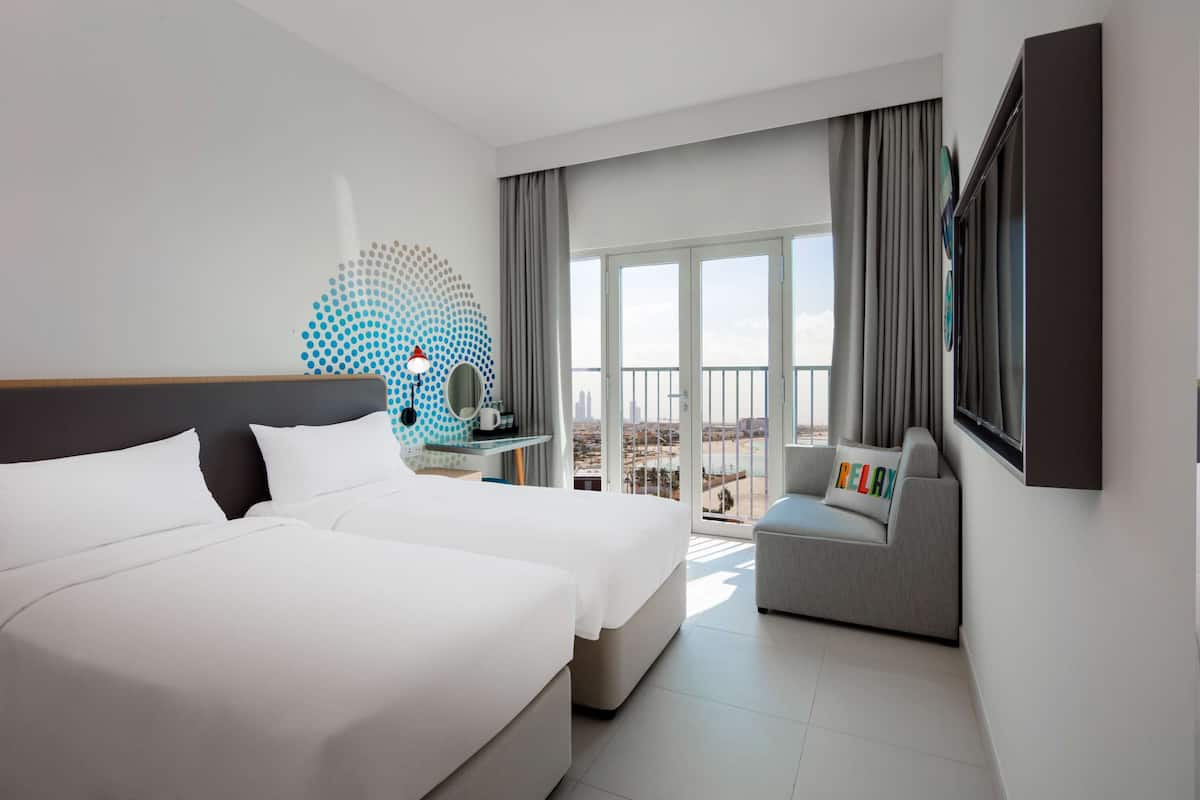 rover room free shuttle service to dubai mall, private beach | in-room safe, desk, laptop workspace, blackout curtains