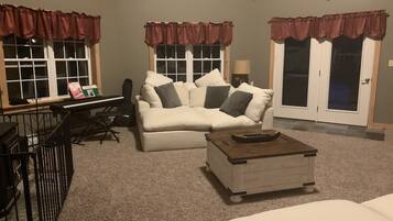 Smart TV, fireplace, books, offices