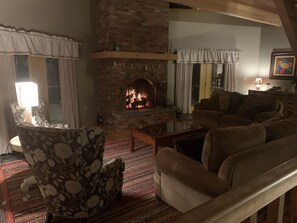 Smart TV, fireplace, books, offices