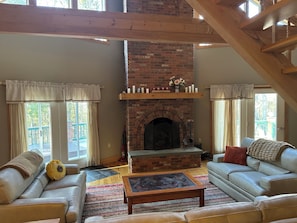 Smart TV, fireplace, books, offices