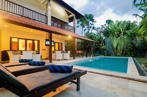 Outdoor pool - Experience Mawar Estate, a 7-bedroom private villa estate in Seminyak. Accommodates up to 14 guest, includes daily breakfast, a full-time private chef, airport transfers, complimentary massages, housekeeping, and a dedicated driver. (Seminyak)