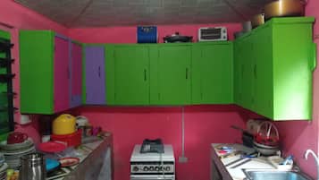 Deluxe Quadruple Room | Shared kitchen