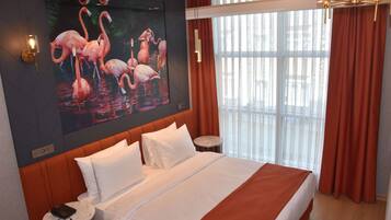 Standard Double Room | Minibar, in-room safe, individually decorated, individually furnished