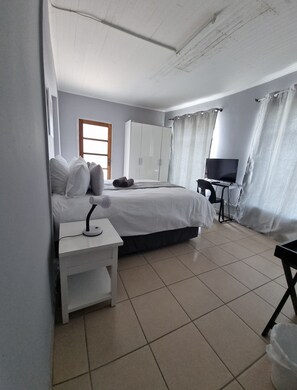 Family Room | Private kitchen | Mini-fridge, microwave, electric kettle, cookware/dishes/utensils - Stay @ Home Airport Lodge (Kempton Park)