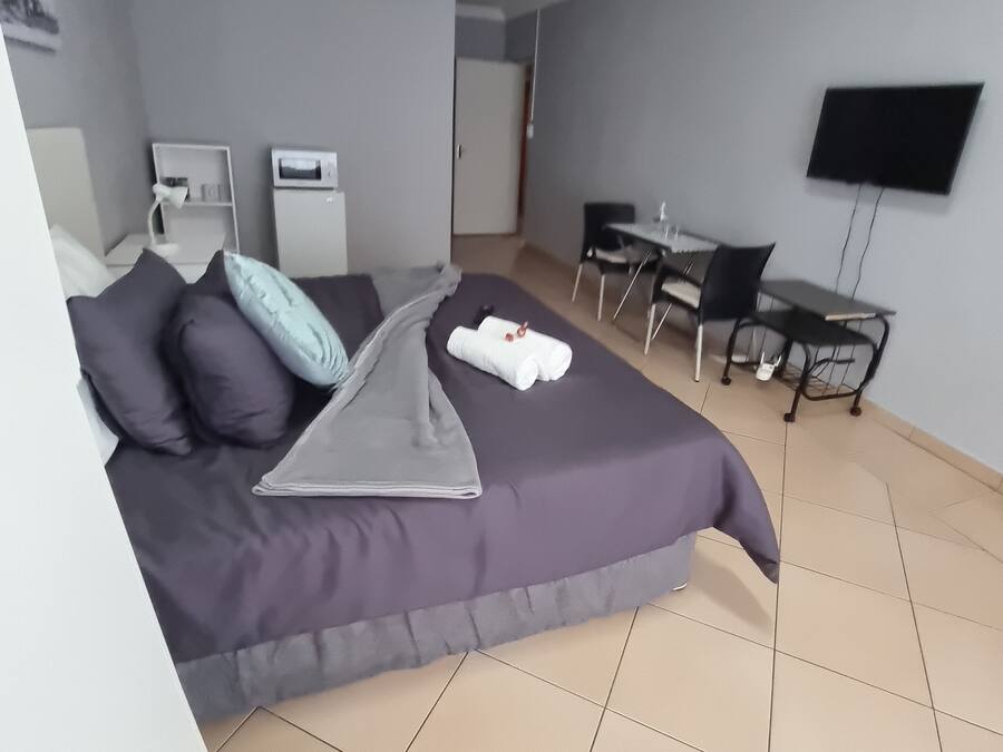 Suíte luxo, 1 cama de casal | Escrivaninha, espaço de trabalho para notebook