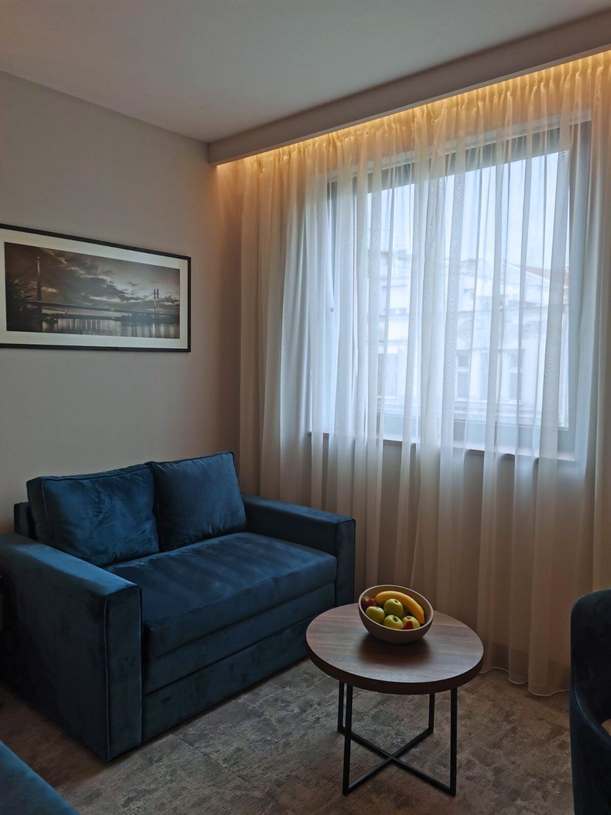 standard double room | living room | 40-inch smart tv with cable channels, pay films