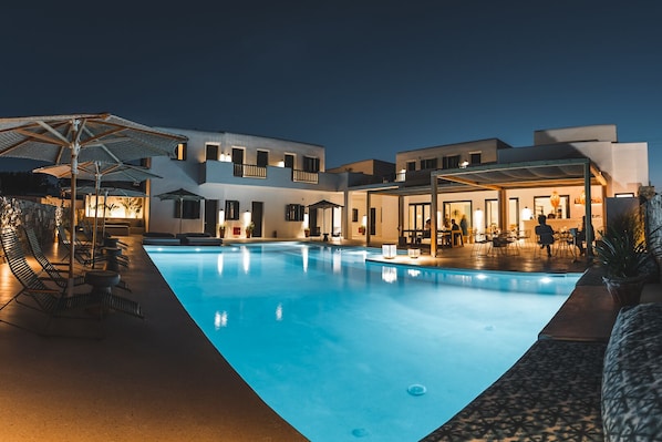 Seasonal outdoor pool, pool umbrellas, pool loungers