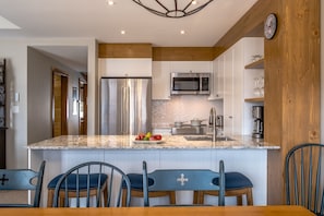 Les Falaises 134-12 | Private kitchen | Full-size fridge, microwave, oven, stovetop