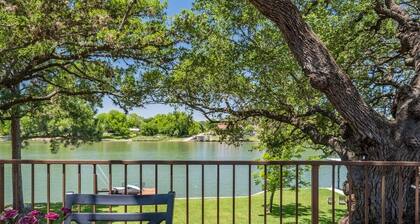 Burl Wood Cabin Lakefront w/ Shaded Yard & Fishing