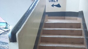 A staircase with a sign indicating it is staff only. - Mombasa Guest House (Kerugoya)