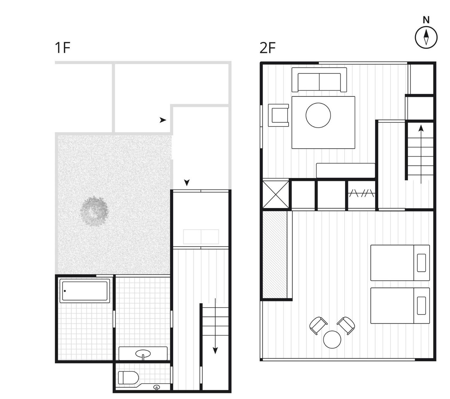 Plano de planta de una habitación de hotel con una amplia zona de estar, un comedor independiente y una kitchenette.