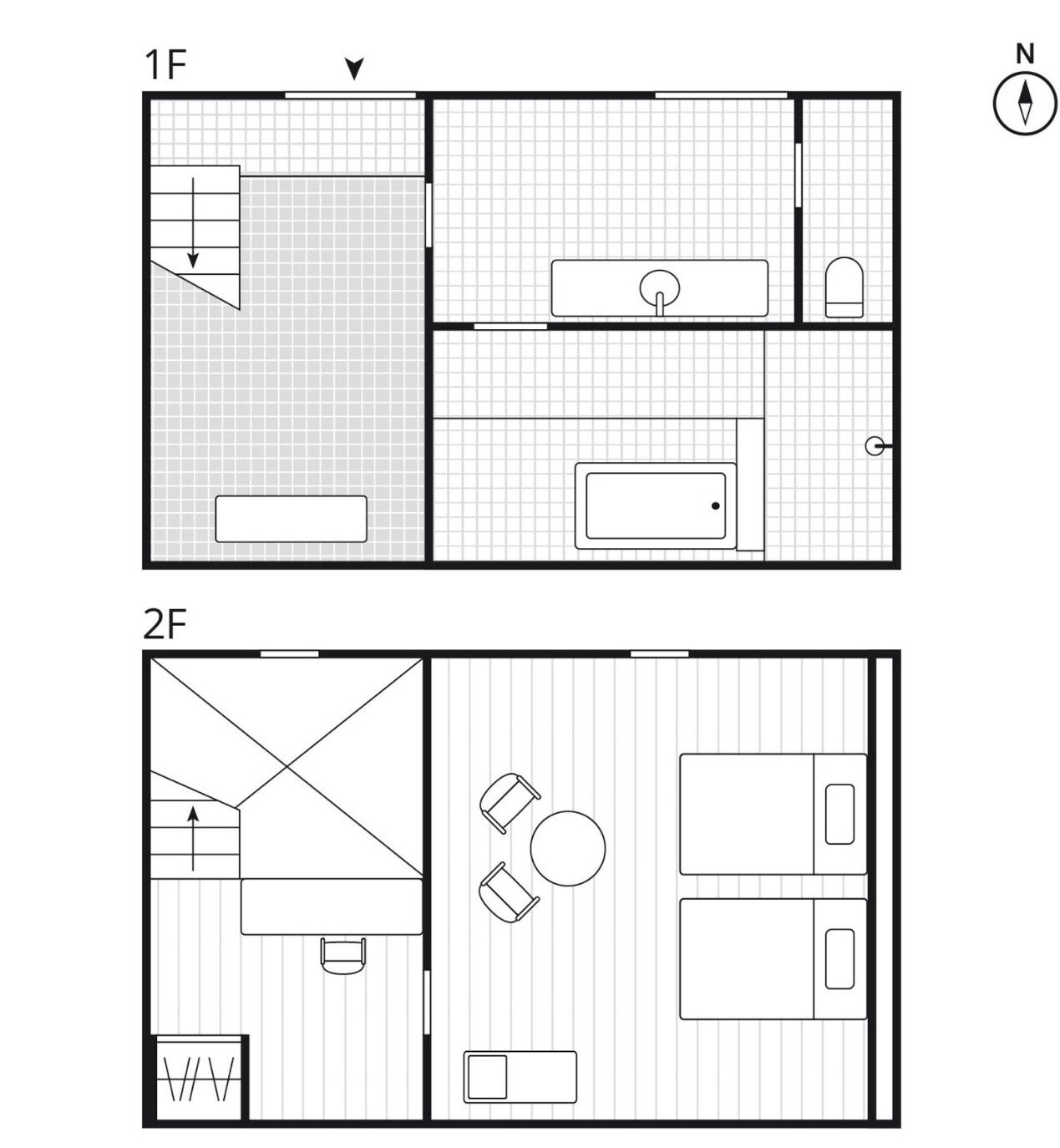 A floor plan of a hotel room with a bathroom, a kitchenette, and a seating area.