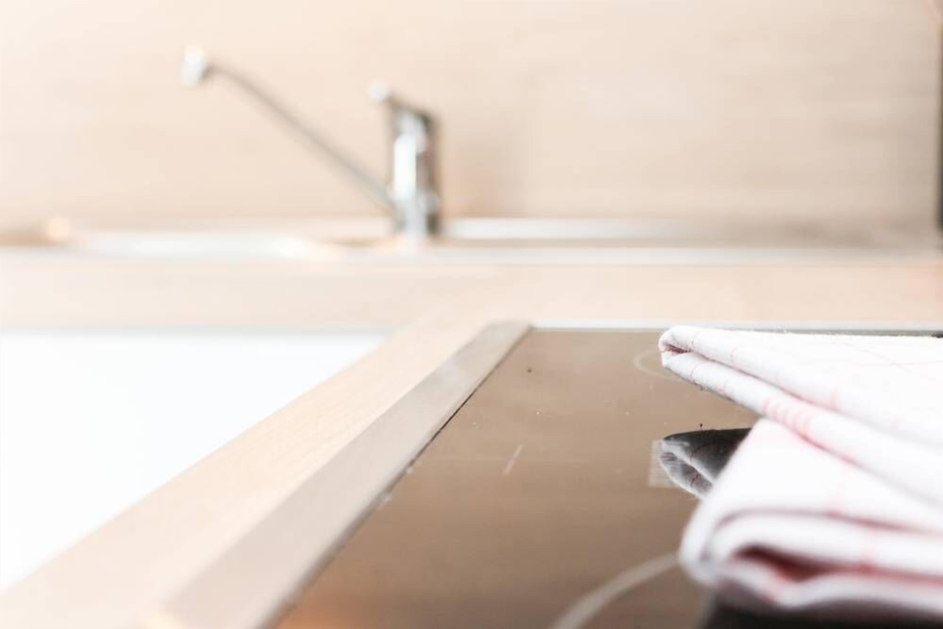 A bathroom with a sink and a towel.