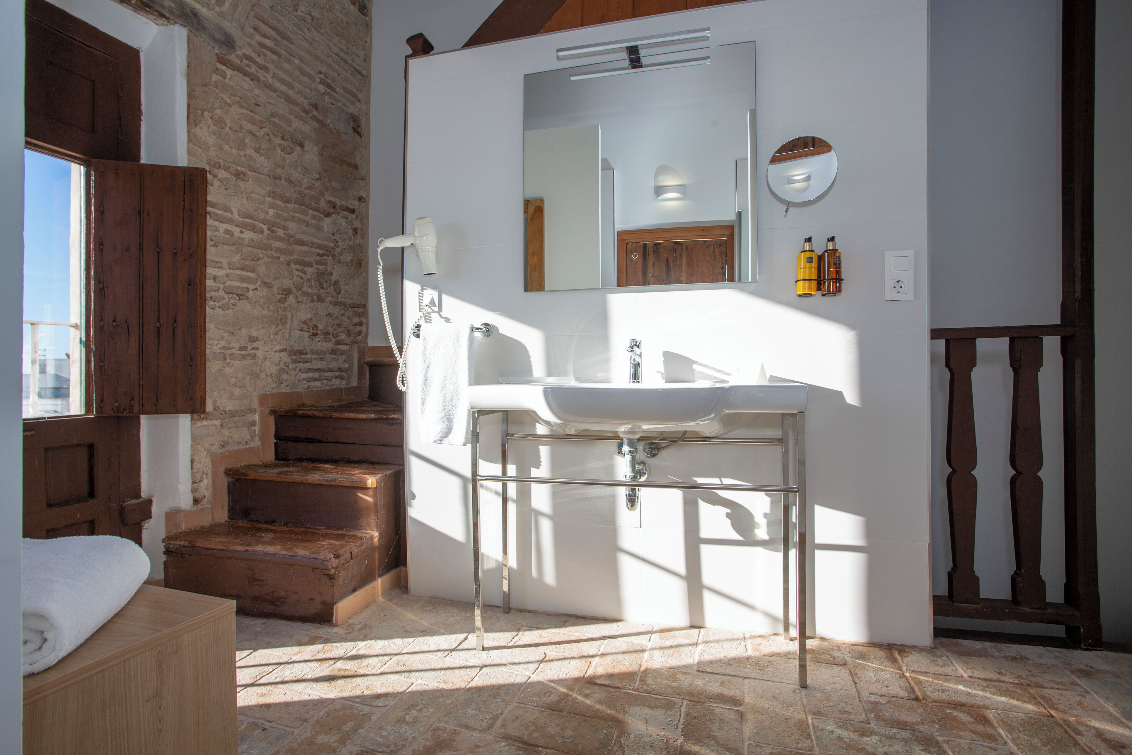 superior double room | bathroom | shower, hair dryer, towels, soap