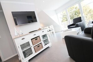 Apartment, 2 Bedrooms | Living area | Flat-screen TV - Kleine Auszeit (Krummhoern)