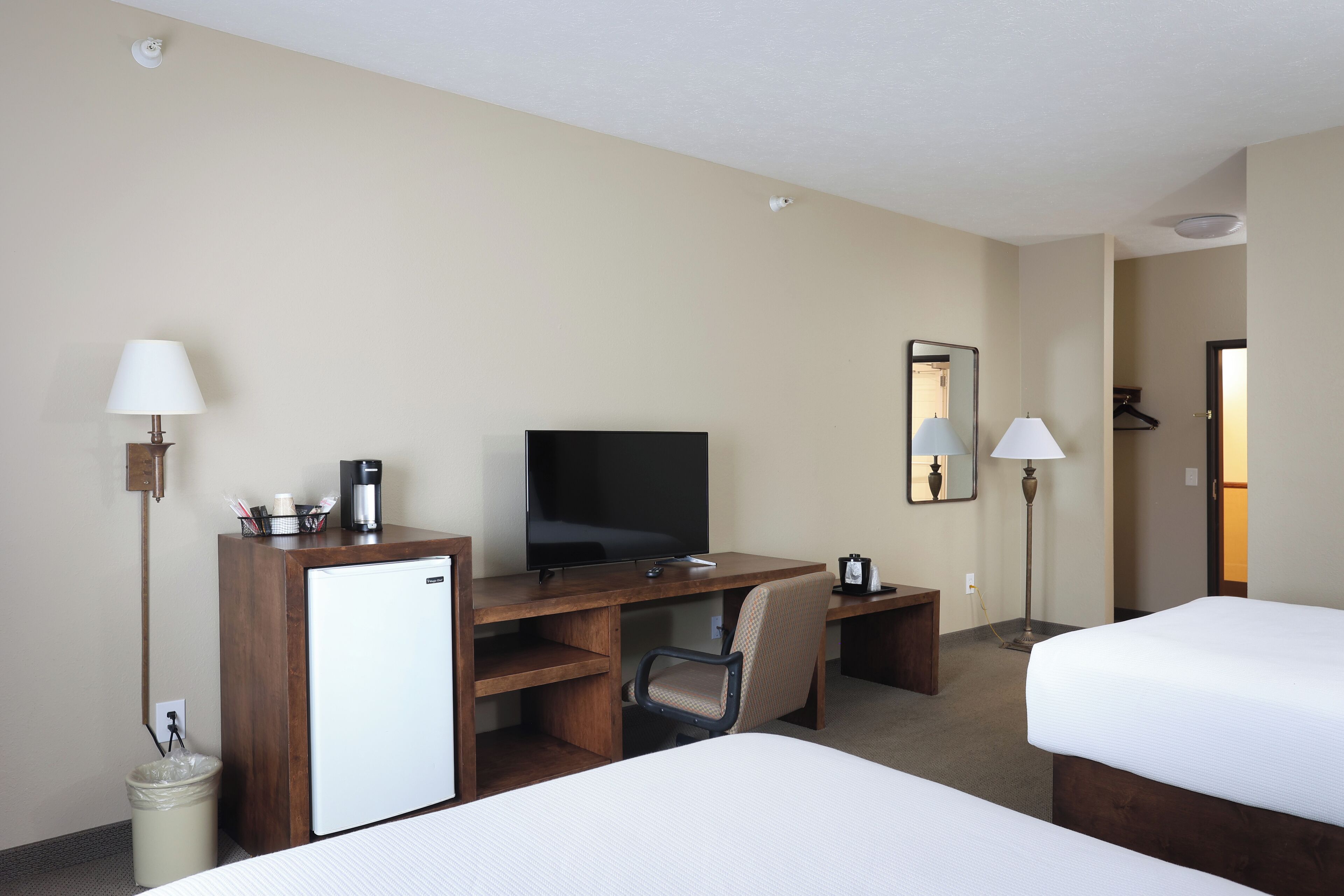 desk, laptop workspace, blackout curtains, iron/ironing board