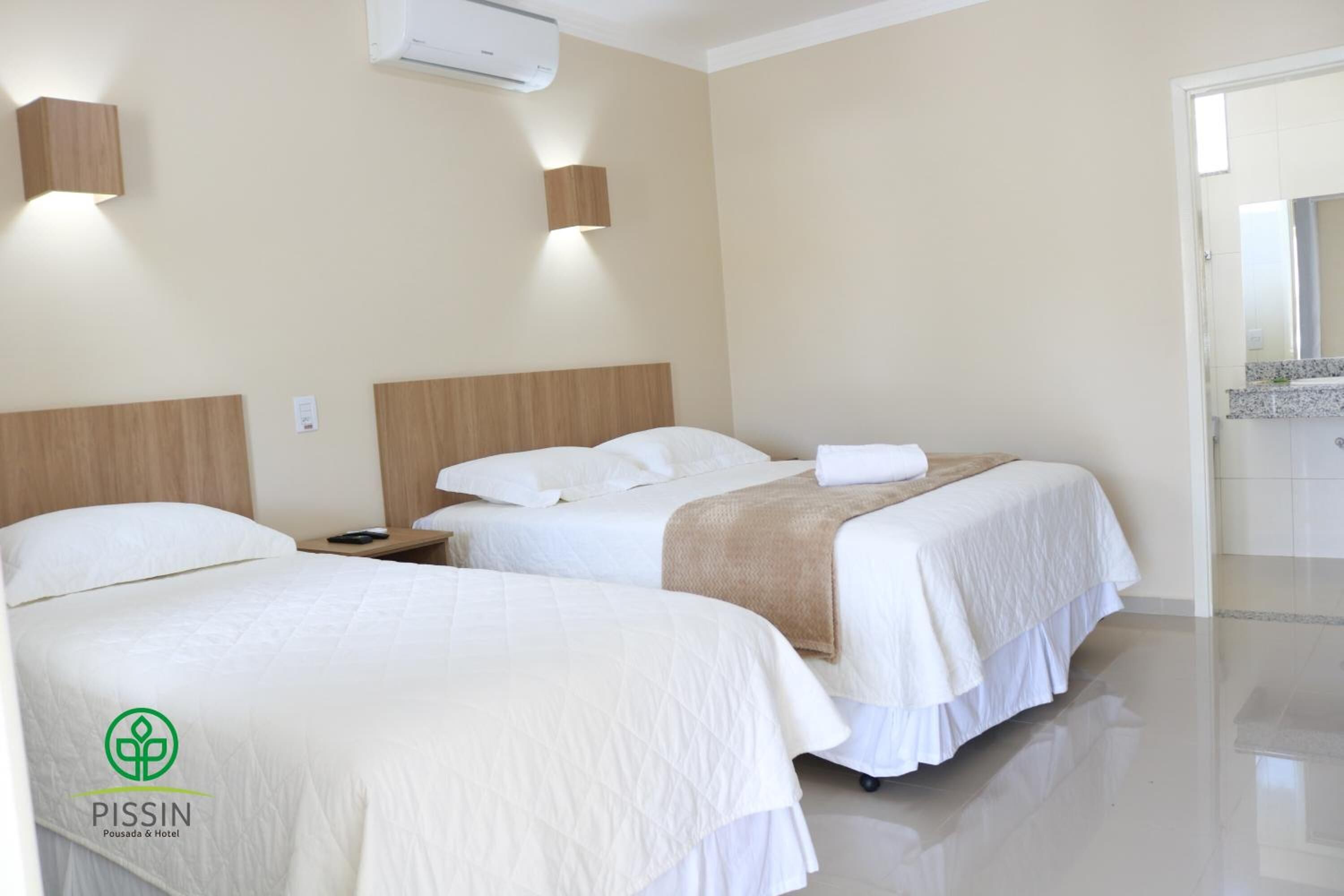 Standard Triple Room | Minibar, desk, iron/ironing board, free WiFi