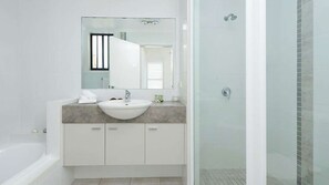 Bathtub, hair dryer, towels