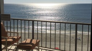A balcony with a view of the ocean, two chairs, and a railing. - Beach Front 2 bedroom 2 bath 7th floor condo in the prestigious Brigadune  (Myrtle Beach)