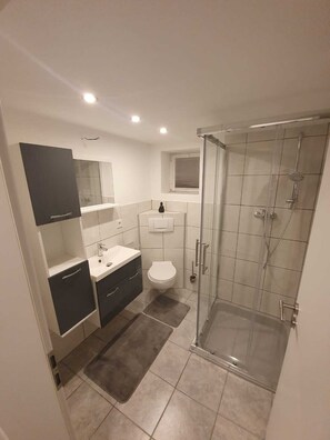 Hair dryer, towels, soap, toilet paper